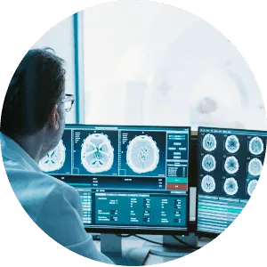 Medical professional reviewing PET/CT scans
